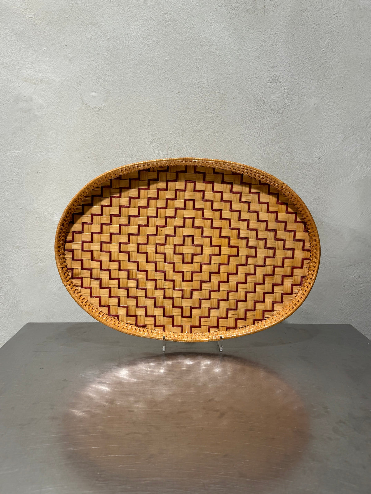 Mid-century oval rattan tray with geometric weave