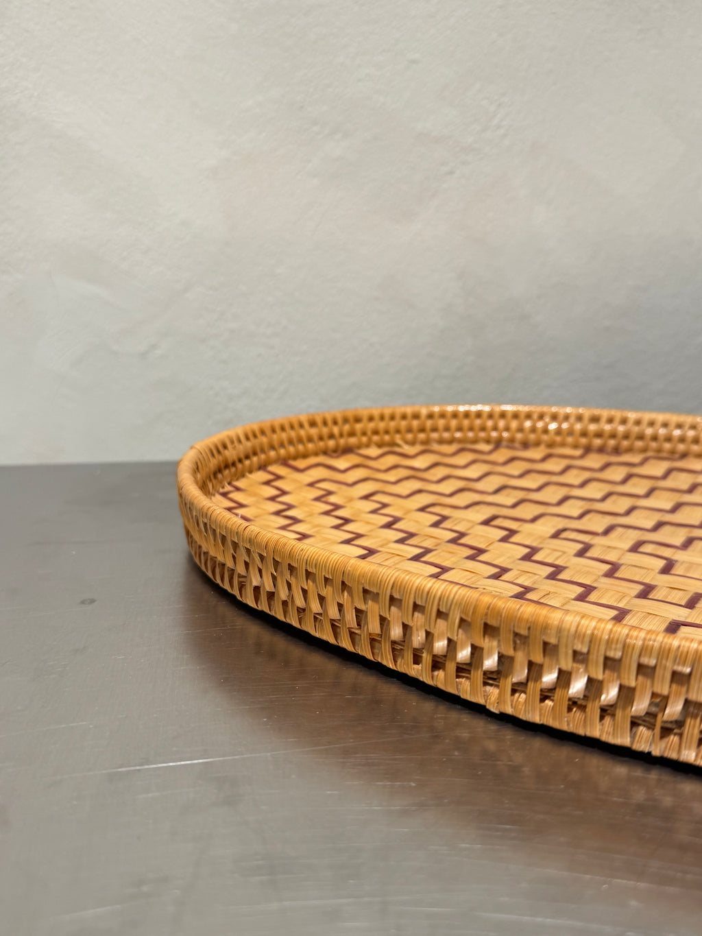 Rattan tray with raised woven rim