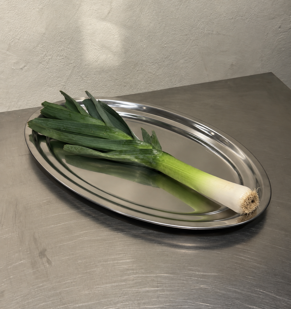 Large oval stainless steel serving tray with leek