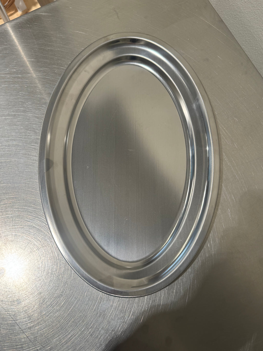 Oval stainless steel serving tray