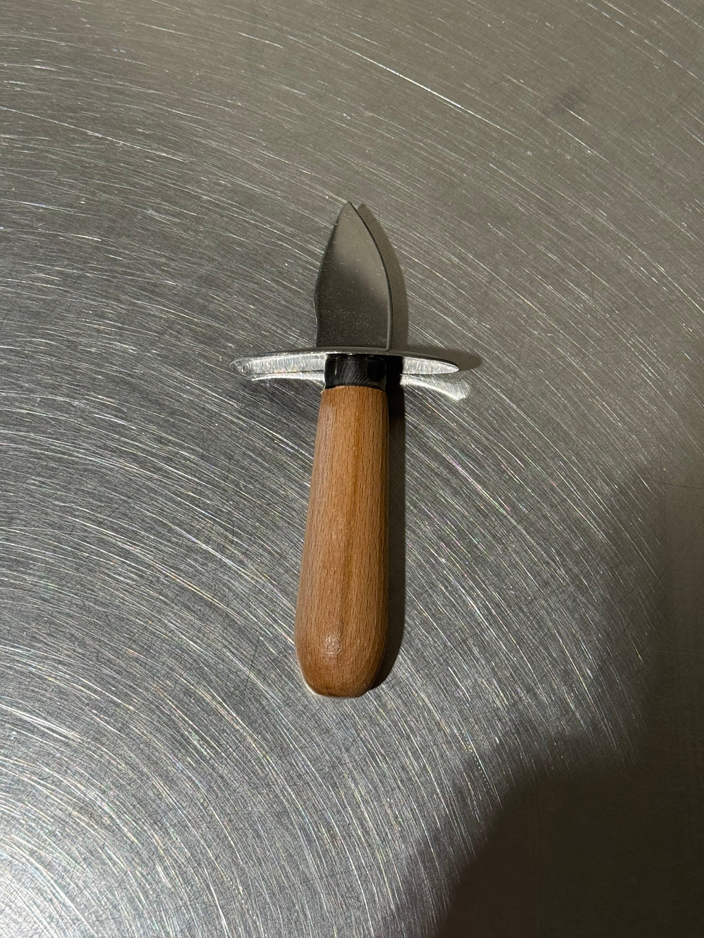Ostronkniv i rostfritt stål med trähandtag