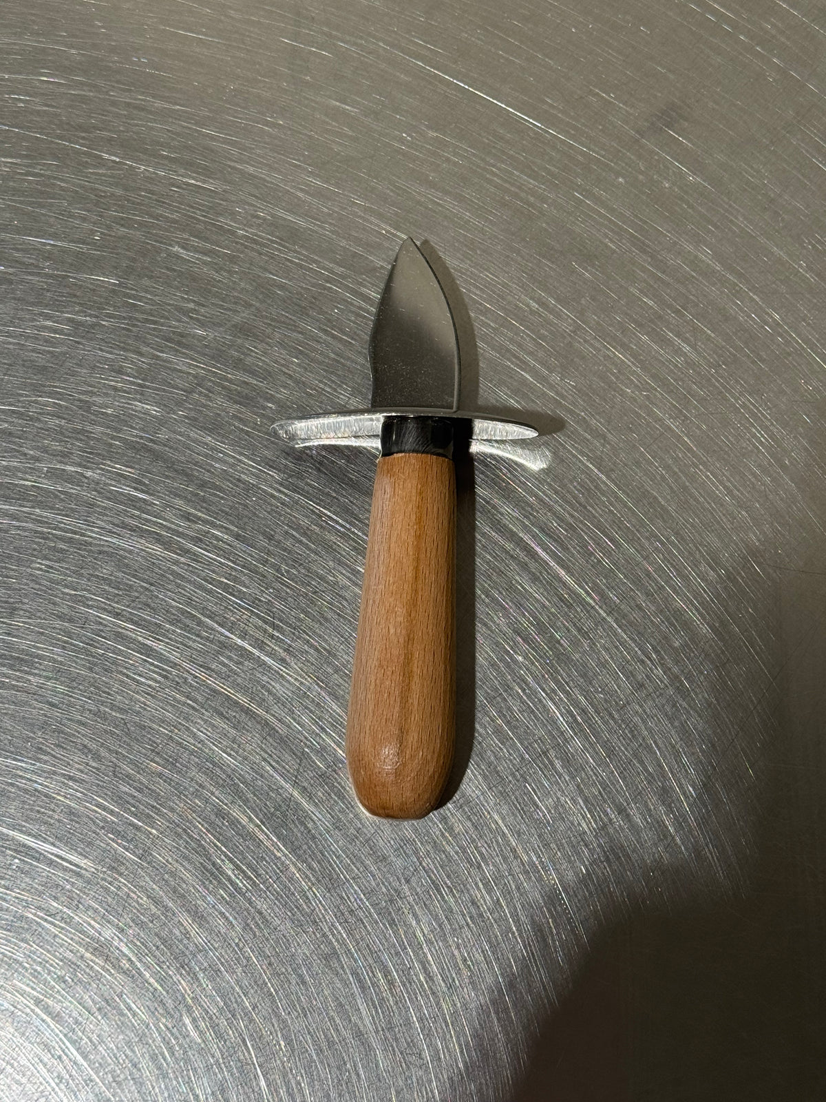 Ostronkniv i rostfritt stål med trähandtag
