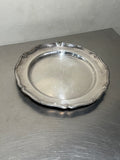Round silver-plated tray with decorated border