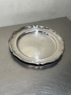 Round silver-plated tray with decorated border
