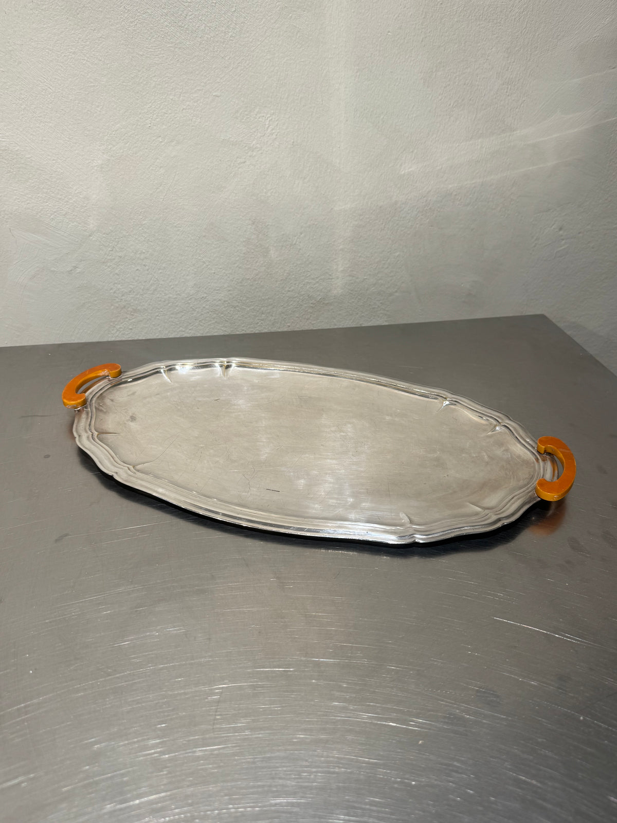 Silver-plated tray with mustard Bakelite handles