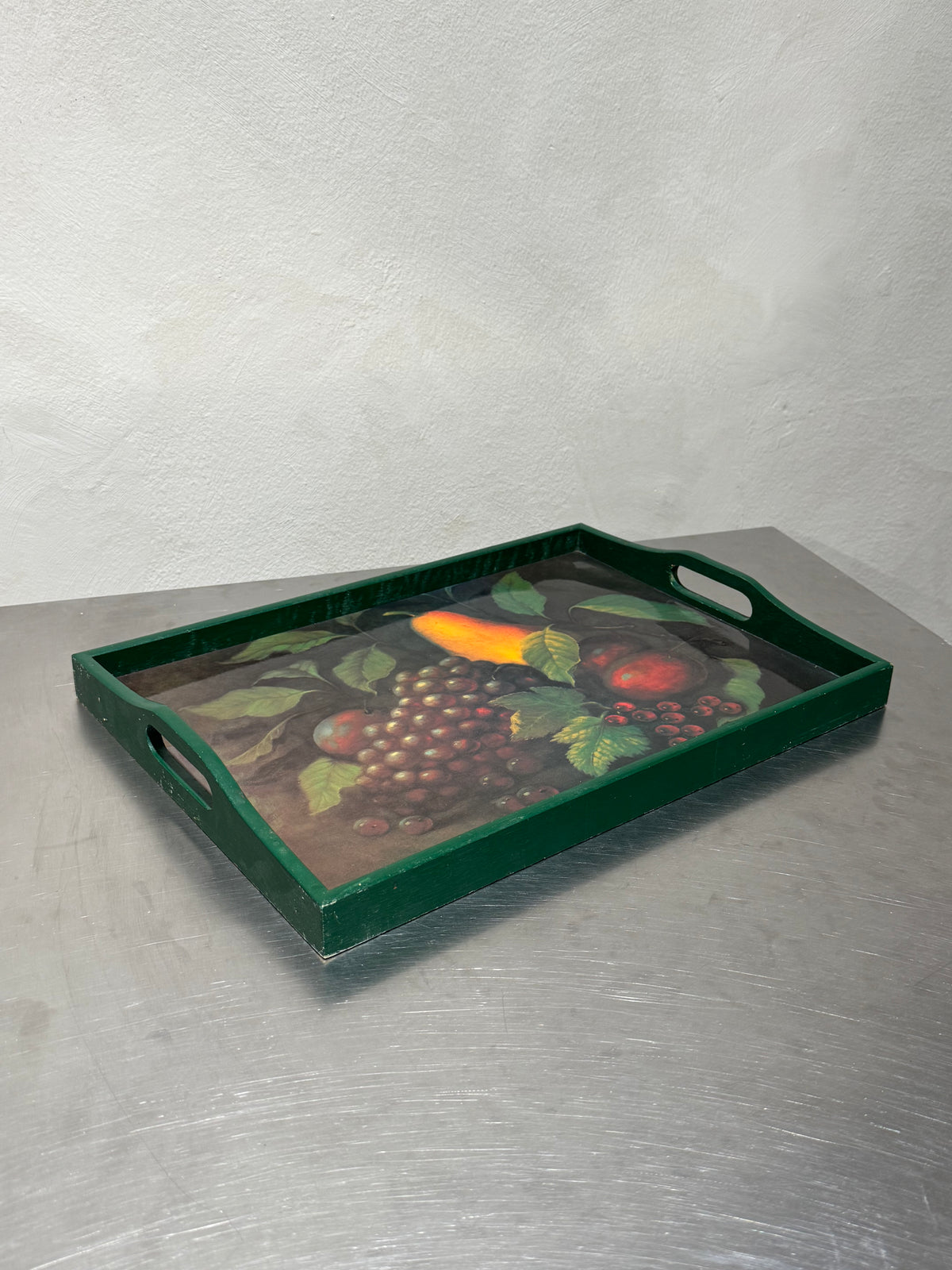 Still-life serving tray with green wooden frame