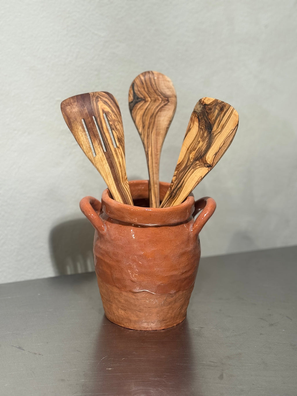 Olive wood slotted spatula