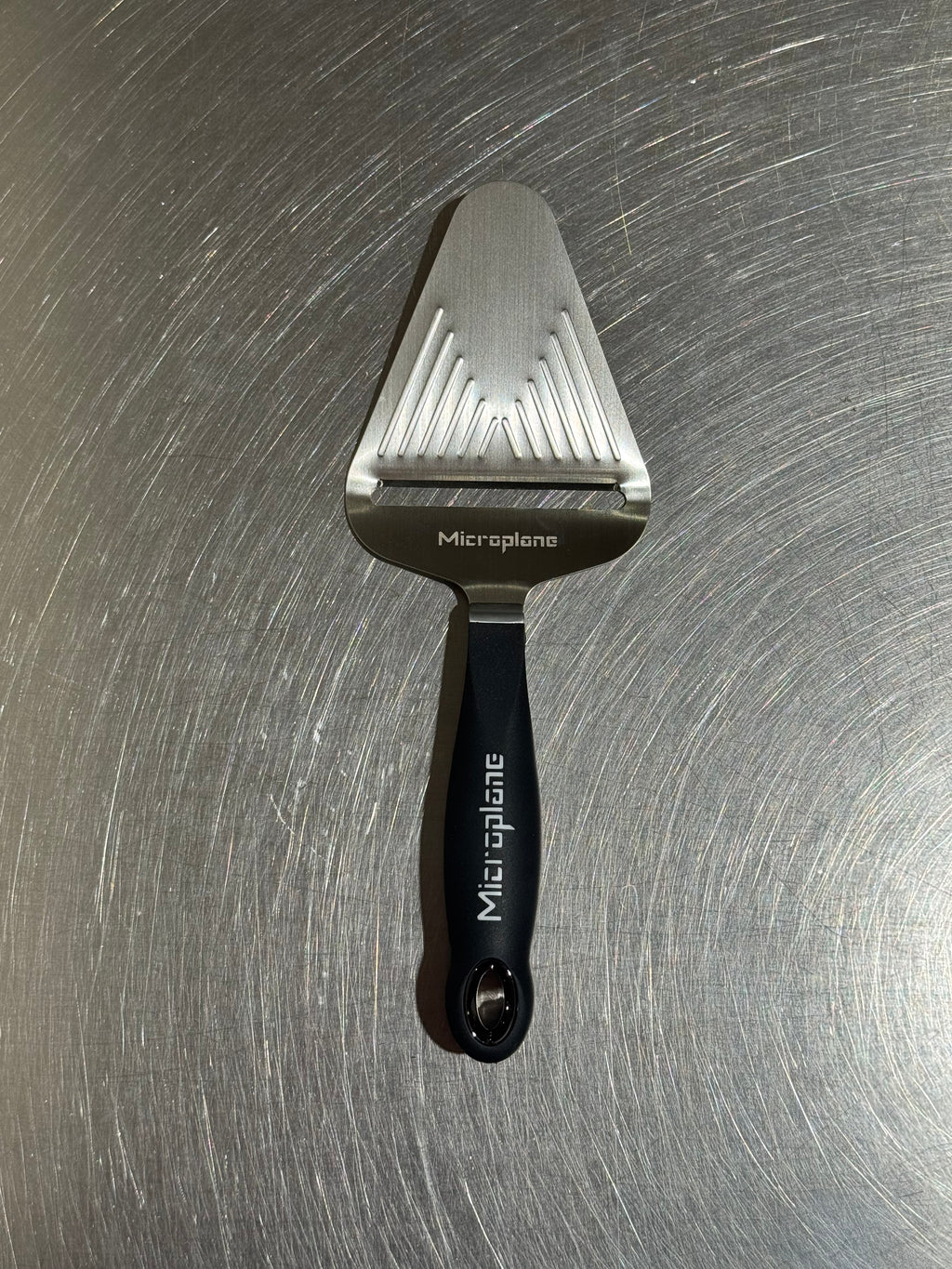 Microplane cheese slicer in black and stainless steel