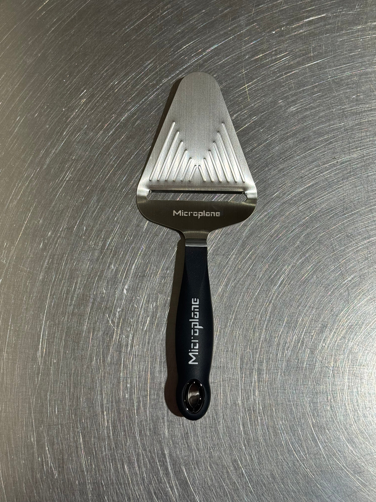 Microplane cheese slicer in black and stainless steel