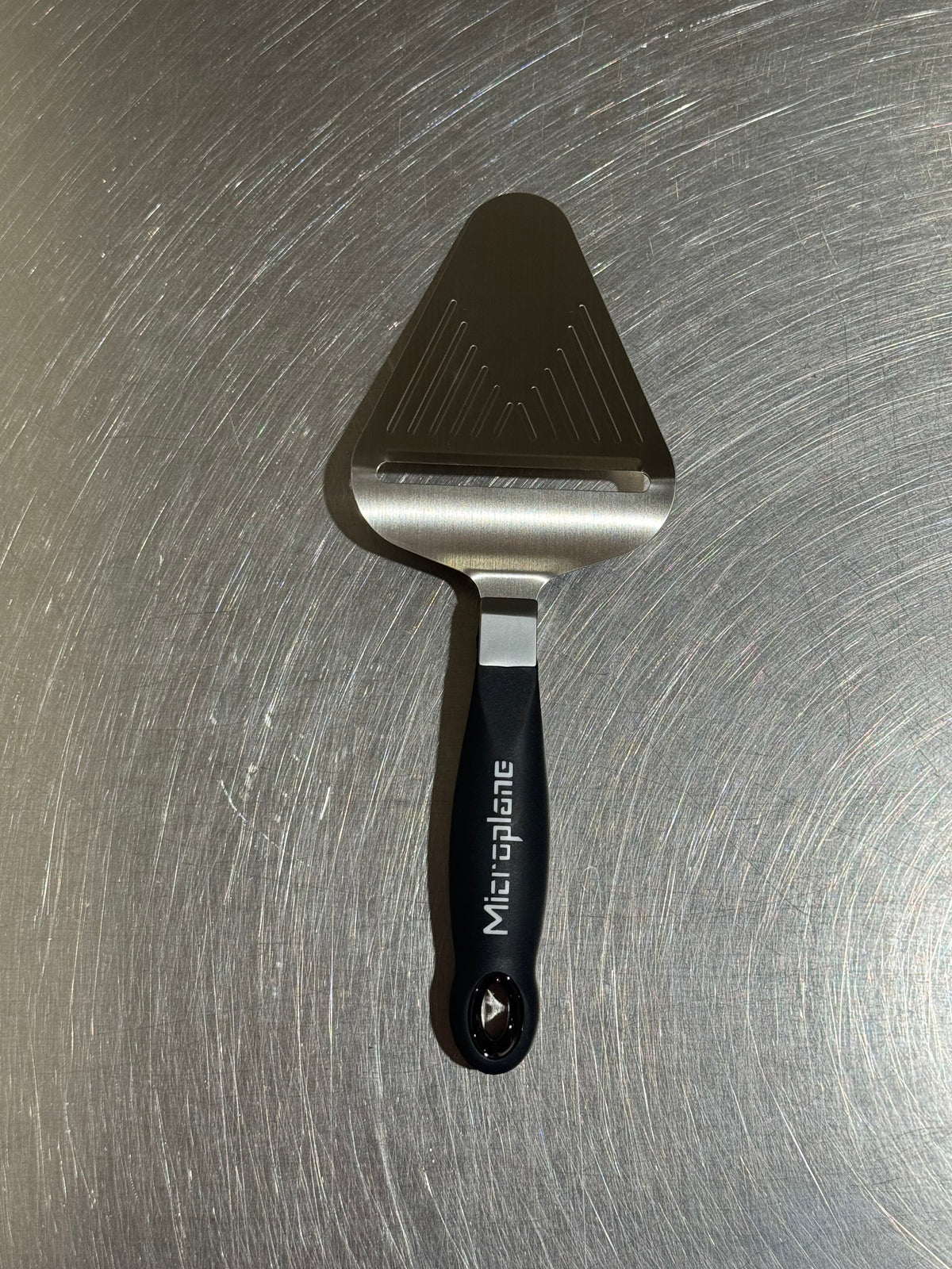 Microplane cheese slicer in black and stainless steel