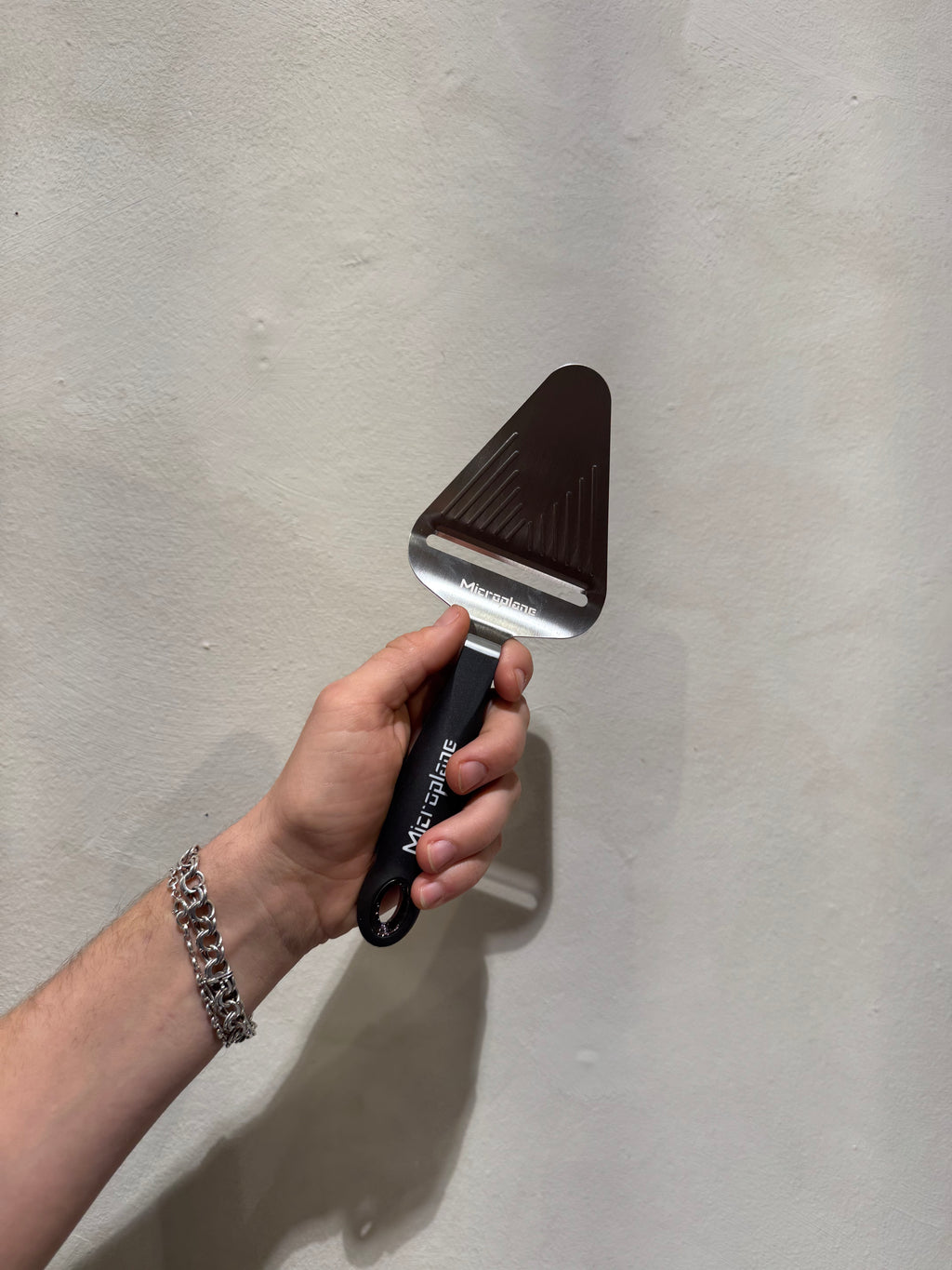 Microplane cheese slicer in black and stainless steel