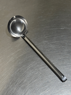 Tomatto stainless-steel soup ladle, front view