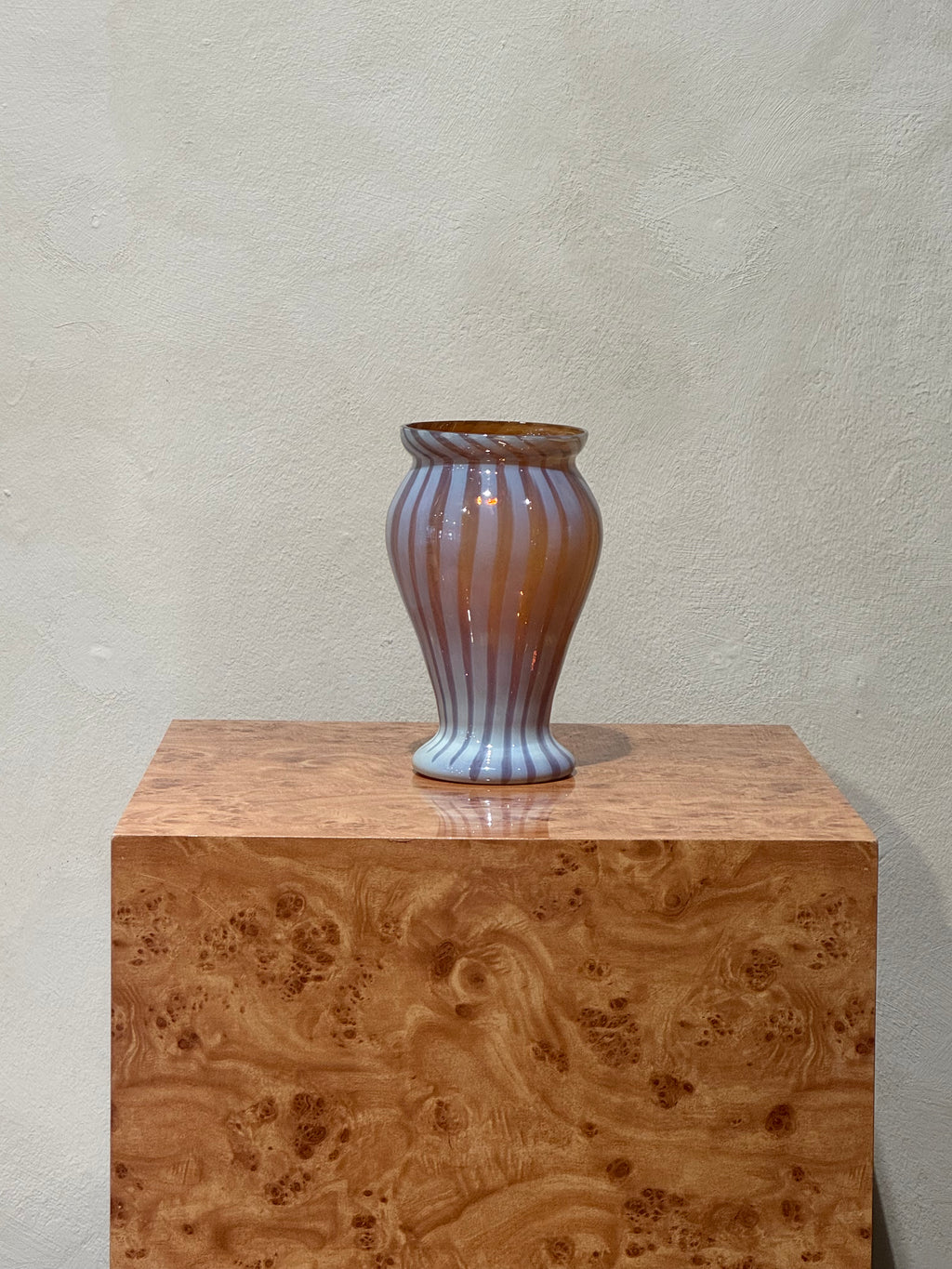 Striped amber and milk-white glass vase
