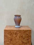 Striped amber and milk-white glass vase
