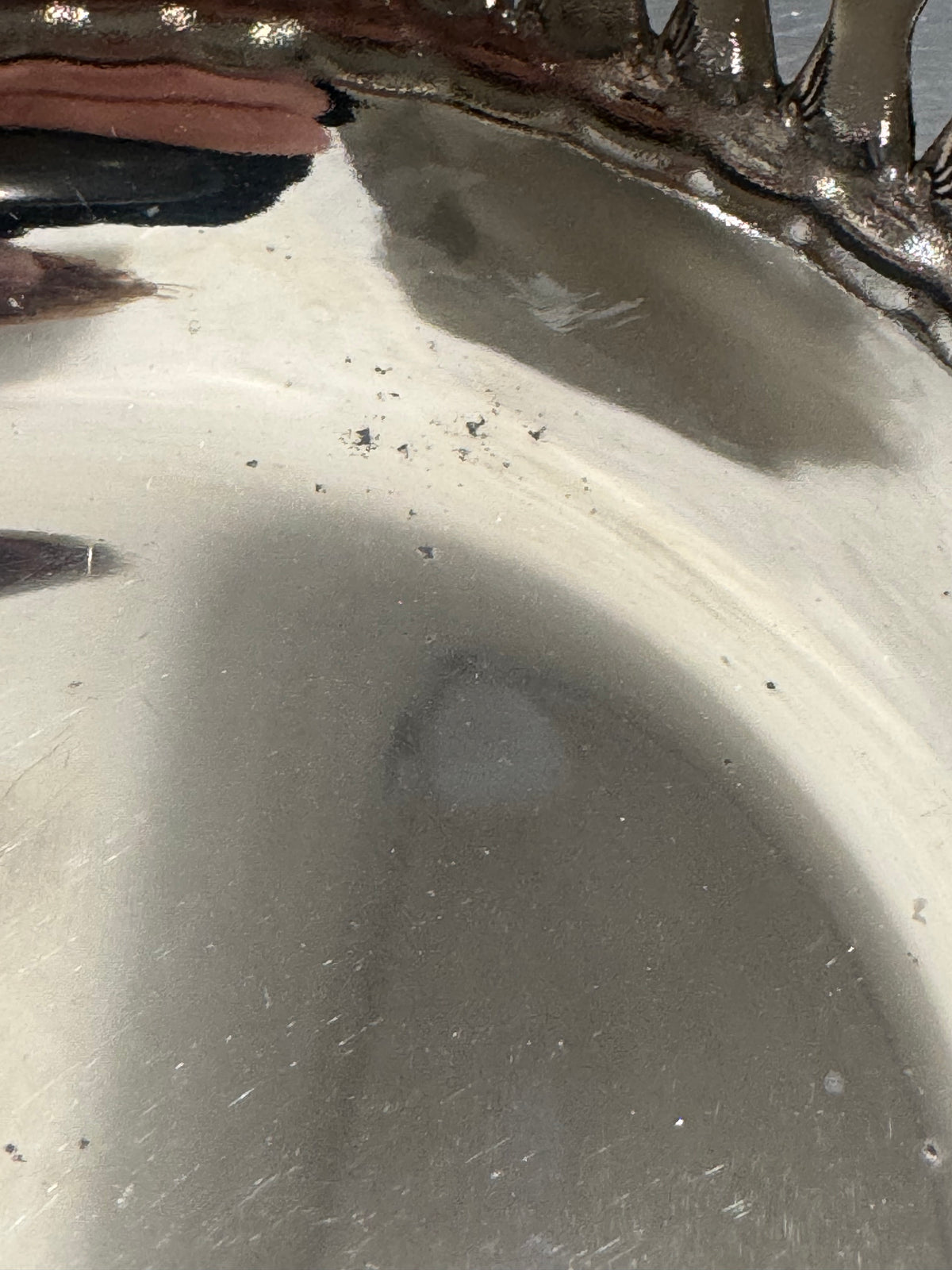 Detail of dark spots on nickel silver bowls