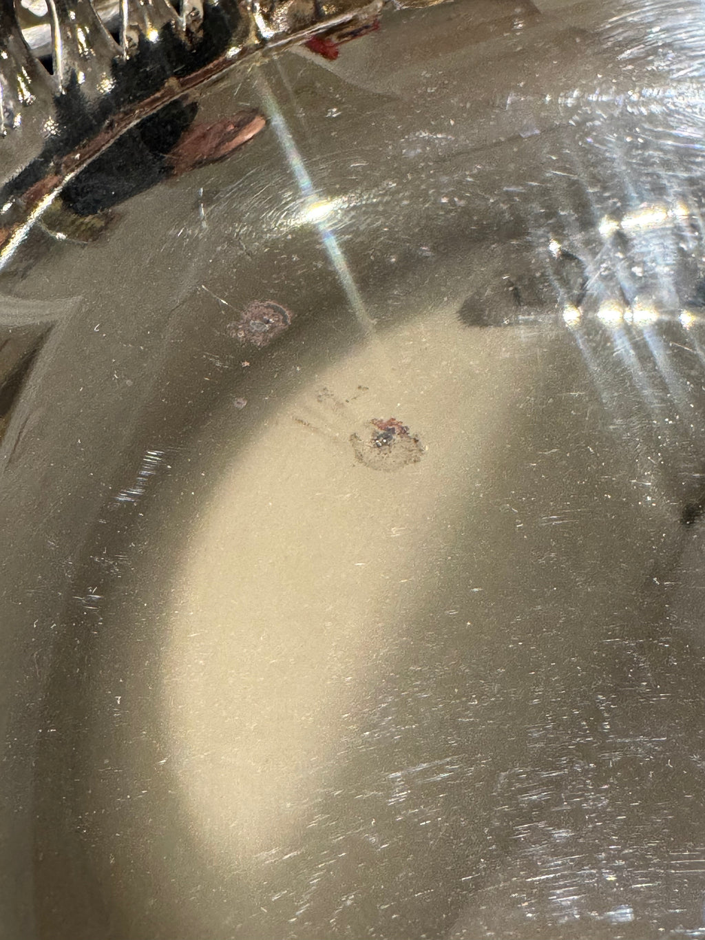 Detail of dark spots on nickel silver bowls
