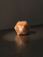 Faceted onyx paperweight
