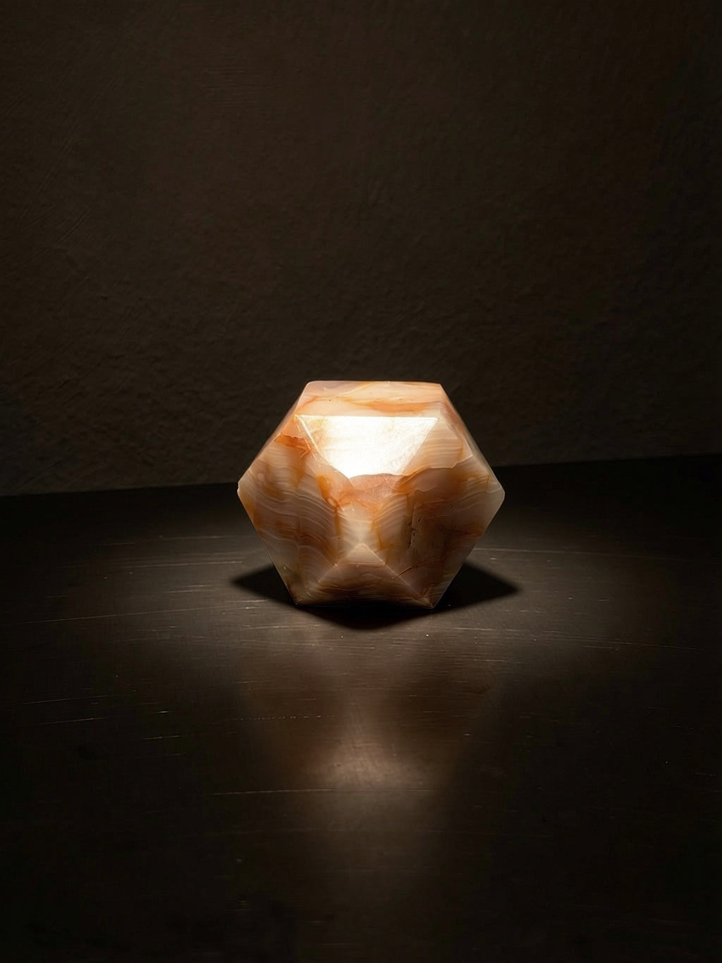 Faceted onyx paperweight