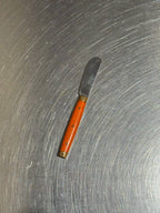 Orange Melron butter knife maker's mark